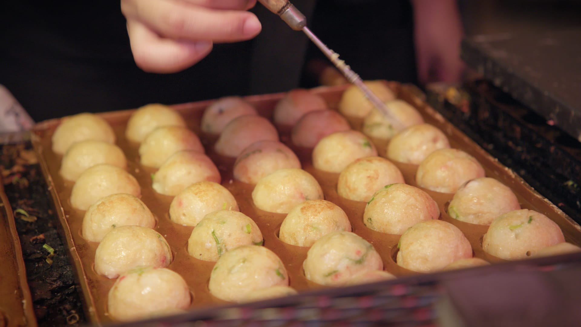 Takoyaki being made in Tokyo